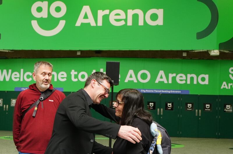 Greater Manchester mayor Andy Burnham hugs Figen Murray, the mother of Manchester Arena bombing victim Martyn Hett
