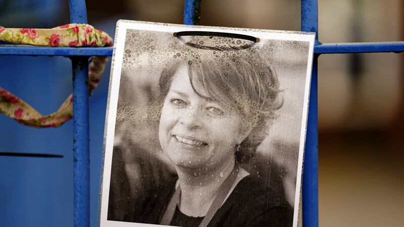 A photo of Ruth Perry attached to the fence outside John Rankin Schools in Newbury, Berkshire (Andrew MAtthews/PA)