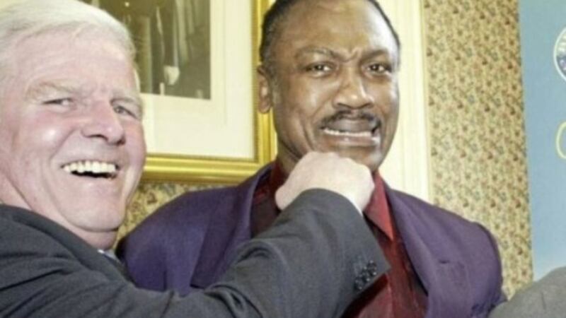 Belfast's Jim McCourt pictured with former heavyweight world champion Joe Frazier. Picture by PA