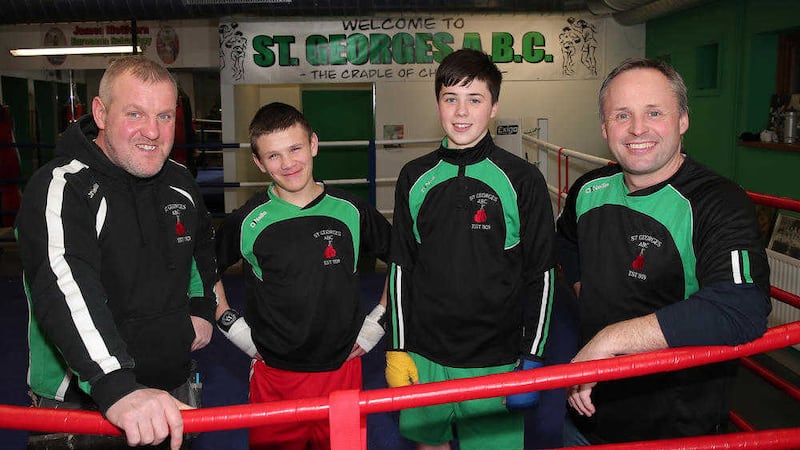 St George's ABC coaches Danny Boyd (left) and Jim McGivern (right) with young boxers Jason McGrady and Jack McGivern<br />Picture by Declan Roughan