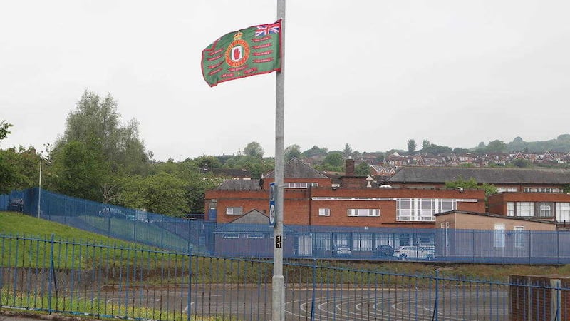 The new Loyalist Communities Council flag has been placed outside Mercy College in north Belfast 