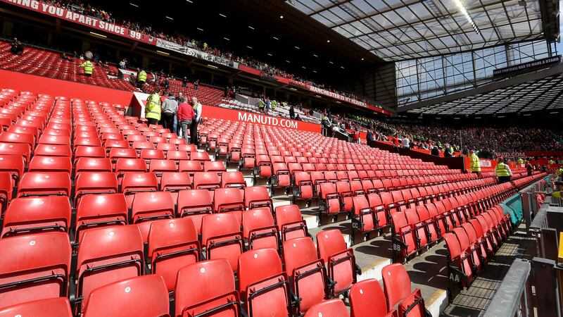 Fans travelling to Manchester United's Old Trafford (pictured) and Anfield in Liverpool could have plans changed by the collapse of Thomas Cook.  Picture by Martin Rickett, Press Association &nbsp;