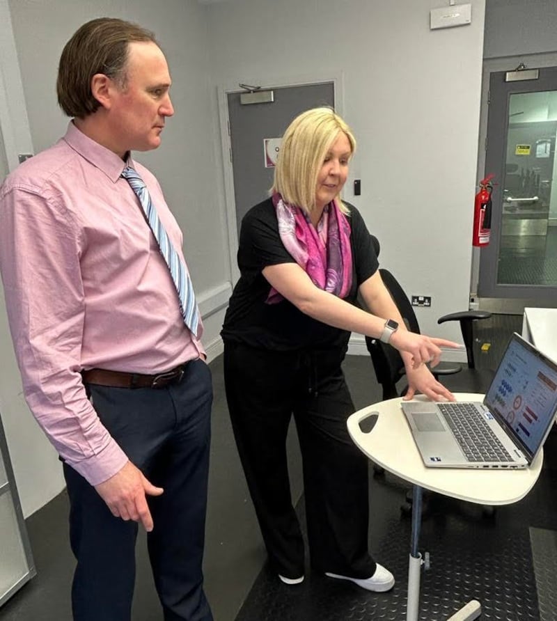 Breast Cancer patient Orlagh O’Neill discussing the survey with Dr Damien Bennett, NICR Director.