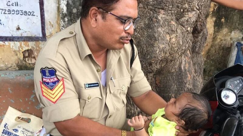 The officer from India reportedly held the baby for 30 minutes and managed to send it to sleep.