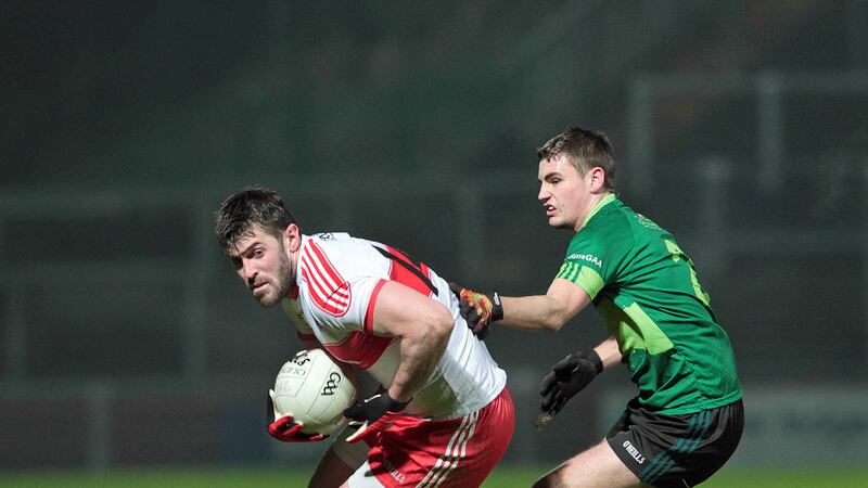 <span style="font-family: Arial, sans-serif; ">Derry's Mark Lynch gets away from Greg McCabe of Queen's during Wednesday night's McKenna Cup match at Celtic Park <br />Picture by Margaret McLaughlin</span>