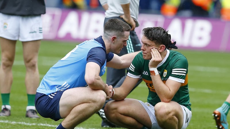 Fellow Footballer of the Year nominee Brian Fenton consoles Kerry captain David Clifford after the All-Ireland SFC Final.