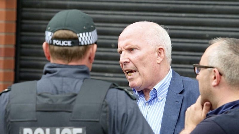 UUP councillor Jim Rodgers as police and contractors moved into Cluan Place in east Belfast to remove a loyalist bonfire last month 