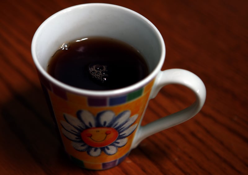 Stock picture of a mug of black tea