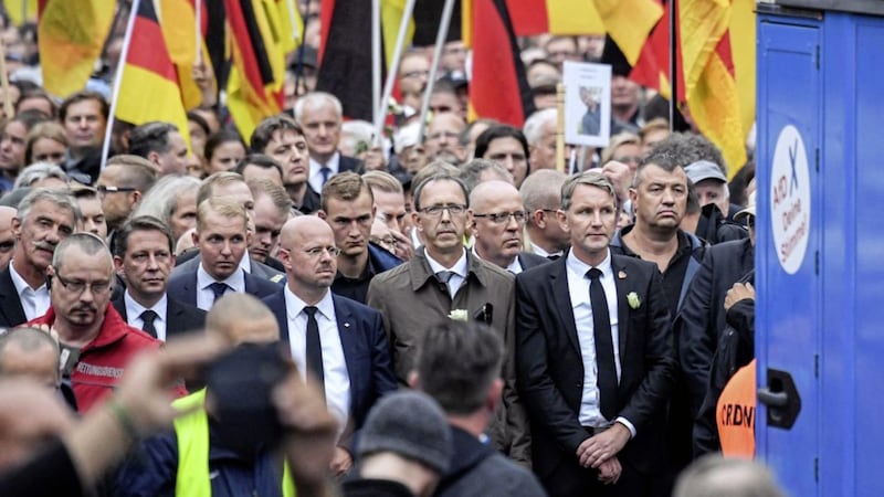 Bjoern Hoecker, leader of the far right Alternative for Germany in German state of Thuringia, second from right, participates in a commemoration march in Chemnitz, eastern Germany on Saturday Picture by Ralf Hirschberger/dpa via AP 