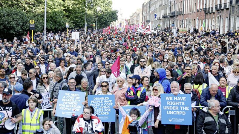 People march through the streets of Dublin on Saturday to protest against increases in the cost of living. Photo: Damien Storan/PA Wire 