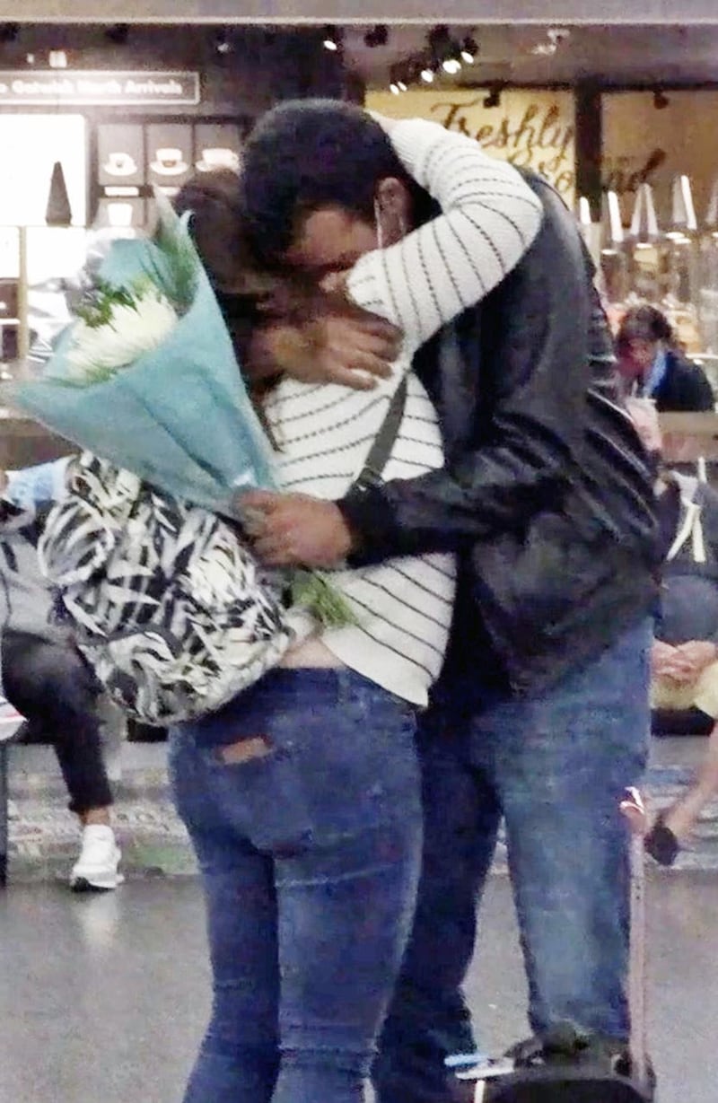 Cristina and Ben hug after being reunited