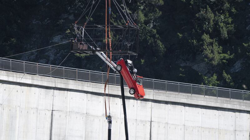 The former cricketer was hoisted up a 400ft dam in Switzerland for one of Top Gear’s most terrifying challenges.
