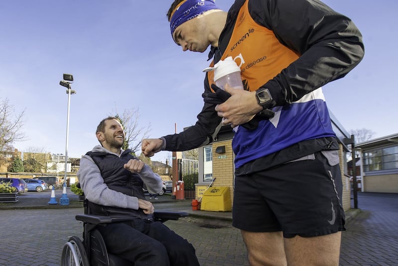 Rob Burrow greeted Kevin Sinfield at the finish line of the fifth marathon in the 7 in 7 challenge (Allan McKenzie