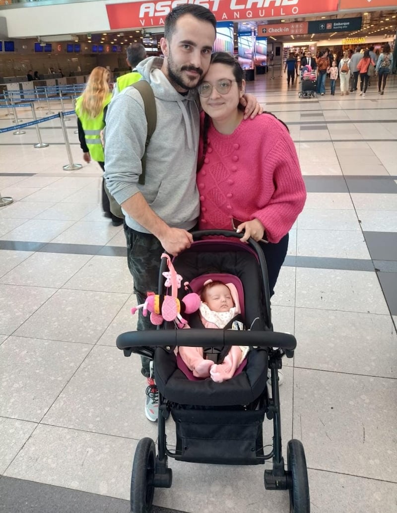 Eugenia Morales with her partner and their baby daughter