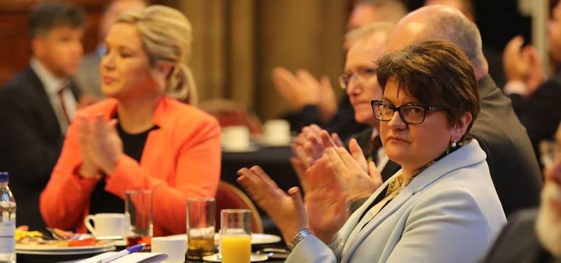 DUP leader Arlene Foster and Sinn F&eacute;in's leader in the north Michelle O'Neill  attend the Ulster fry breakfast at Manchester Town Hall during the Conservative Party Conference at the Manchester Central Convention Complex&nbsp;