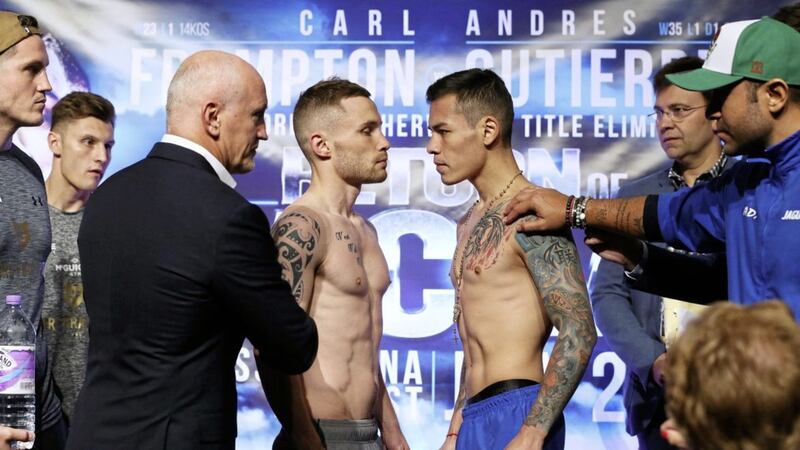 Carl Frampton (left) and Andres Gutierrez during the weigh-in at the Europa Hotel, Belfast in July for the bout which was called off. Picture byBrian Lawless/PA Wire. 