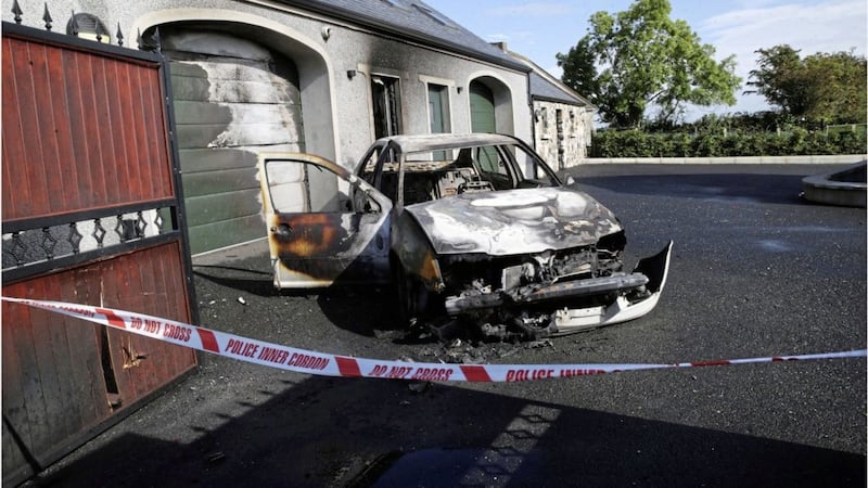 The house on Brustin Brae Road in Larne, Co Antrim, following a gun and arson attack. Picture by Hugh Russell 