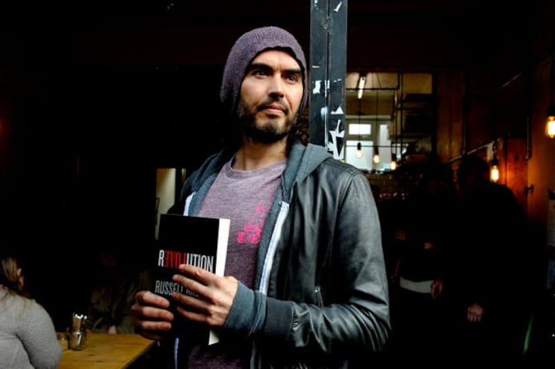 Russell Brand opens the Trew Era Cafe – London