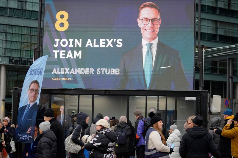 An election poster of National Coalition Party presidential candidate Alexander Stubb in Helsinki (Sergei Grits/AP)