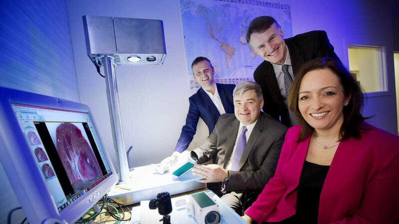 Cirdan Imaging chief executive High Cormican (seated left) with (from left) Allen Martin (Kernel Capital), William McCulla (Invest NI) and Gillian Sadlier (Bank of Ireland). Picture: Brian Morrison 