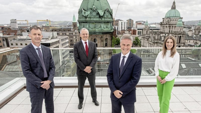 L-R: Ian McConnell, PwC Operate; Kevin Holland, Invest NI; Economy Minister Paul Frew; and Deborah Stevenson, PwC Operate UK. 