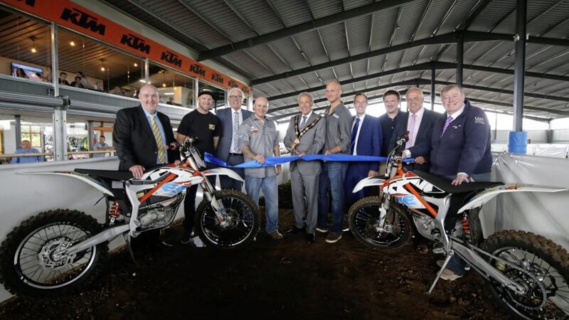 Pictured at the official opening of E-Trax in Moira alongside the Mayor, Uel Mackin are: William Leathem, chairman of the council&#39;s development committee; Martin Barr, British &amp; European Championship Motocross contender; Allan Ewart, vice-chair of the development committee; Kyle Rainey and Gareth George, E-Trax owners and directors; Paul Givan MLA; Cllr Scott Carson; James Tinsley and Paul Porter, chairman of the council&#39;s leisure &amp; community development committee. 
