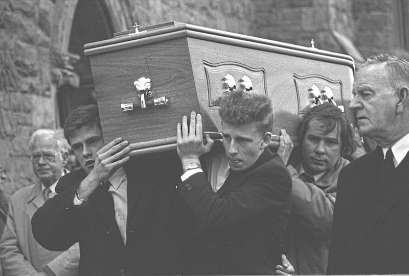 Patrick Kielty carries his murdered father's coffin. Picture by Pacemaker