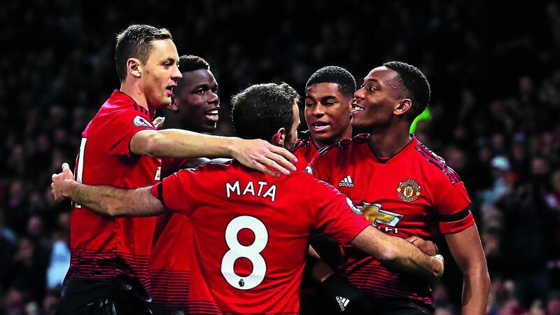 Manchester United's Anthony Martial (right) celebrates scoring his side's second goal against Everton with team-mates during the Premier League match at Old Trafford&nbsp;&nbsp;