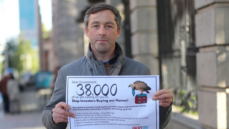 &nbsp;Housing expert Professor Rory Hearne outside Leinster House in Dublin to deliver a petition demanding that the government take more action against vulture funds in Ireland. Picture by Niall Carson/PA Wire
