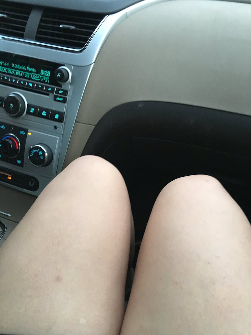 Legs to the centre of the car