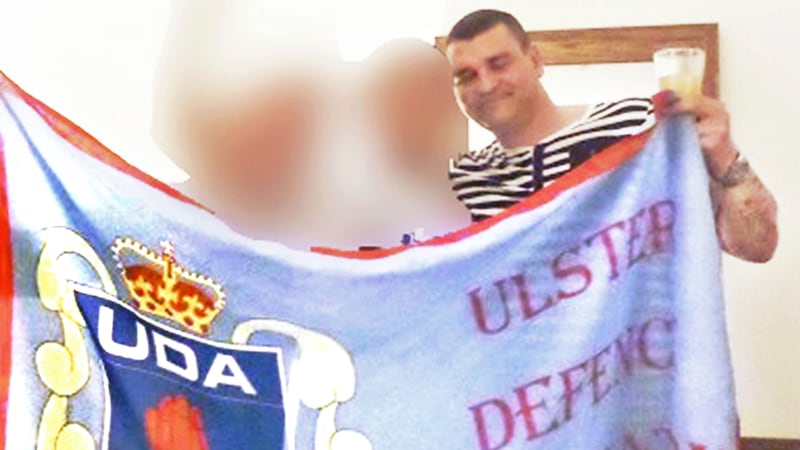 &nbsp;David 'Dee' Coleman, who has been jailed for 18 months for UDA membership, pictured with a UDA flag