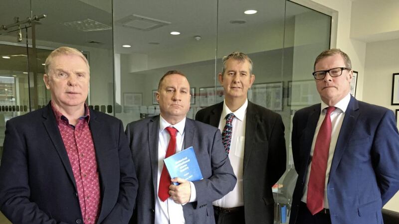 From left, Cyril Glass and Martin Adams from Survivors Together, DUP MLA Edwin Poots and solicitor Kevin Winters. Picture by David Young/PA 