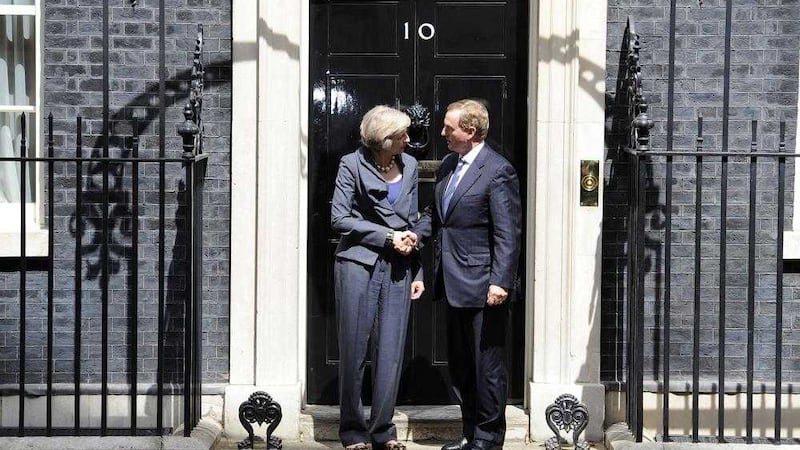 Prime Minister Theresa May greets Taoiseach Enda Kenny upon arrival at 10 Downing Street, London, ahead of the latest meetings on how Brexit will unfold. Picture by Lauren Hurley, Press Association 