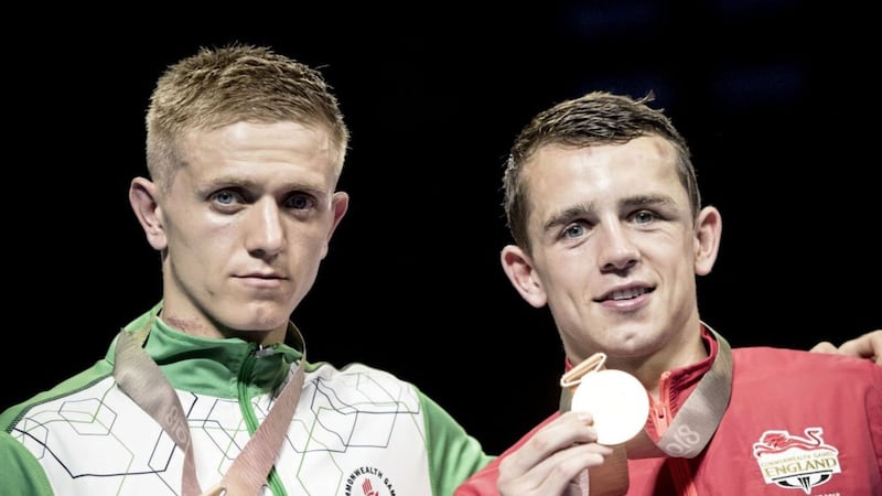 Kurt Walker and Peter McGrail show off their medals after Saturday&#39;s bantamweight final. Pictures by PA 