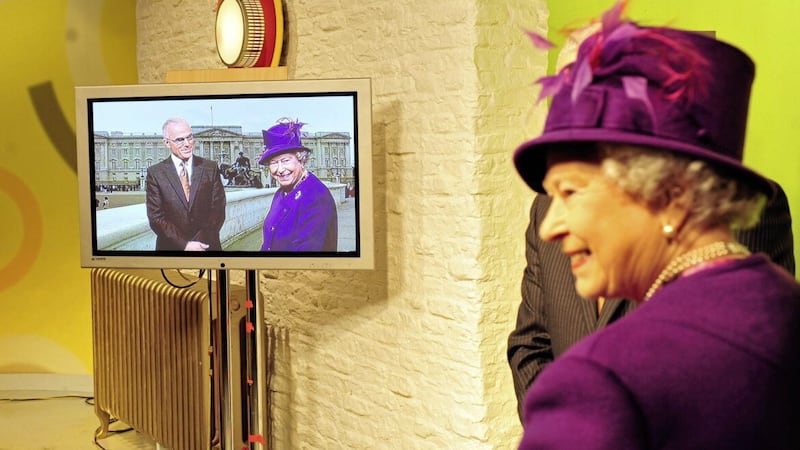 Pacemaker Press 21/10/10 The Queen  on the weather forecast with Frank Mitchell during her visit to The UTV studio as they launch their new HD station at Belfast yesterday Pic Colm Lenaghan/Pacemaker 
