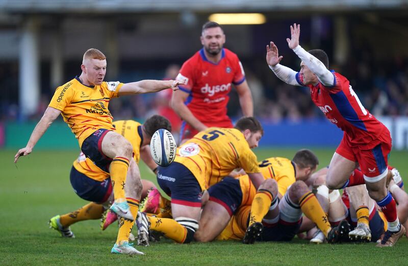 Ulster Rugby's Nathan Doak (left) performs a box kick during the Investec Champions Cup match at The Recreation Ground,