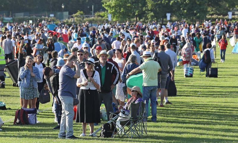 People queuing in Wimbledon Park on day one of the Wimbledon Championships 