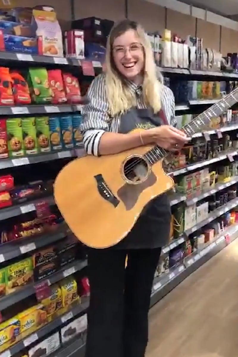 Karina Ramage in Waitrose with her guitar