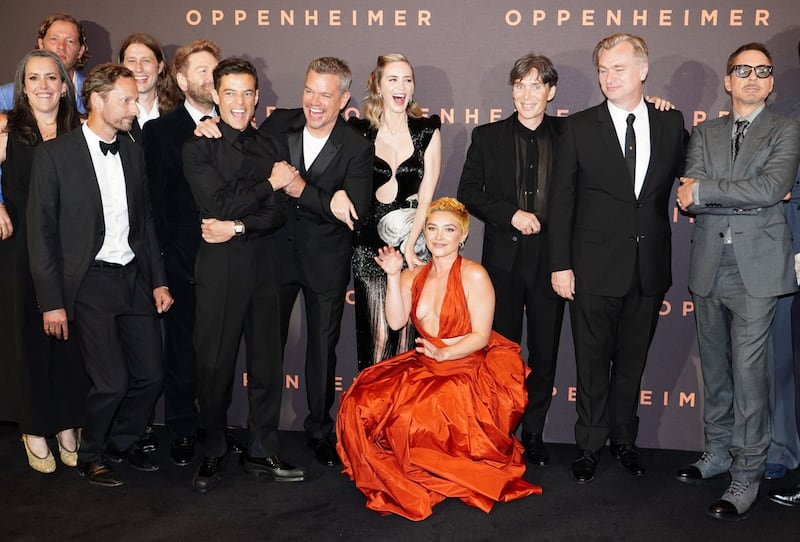 Emma Thomas and Christopher Nolan with the cast of Oppenheimer