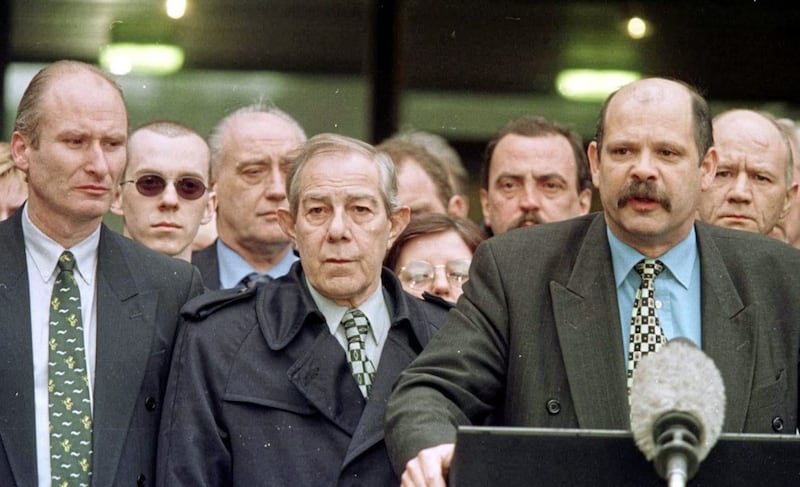 PUP leader David Ervine (right) Hugh Smyth (centre) and Billy Hutchison (left) at Stormont - loyalists accepted a paper on decommissioning rejected by Sinn F&eacute;in 