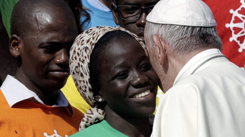 Pope Francis meets a group of migrants, during his weekly general audience, at the Vatican, Wednesday PICTURE: Andrew Medichini/AP 