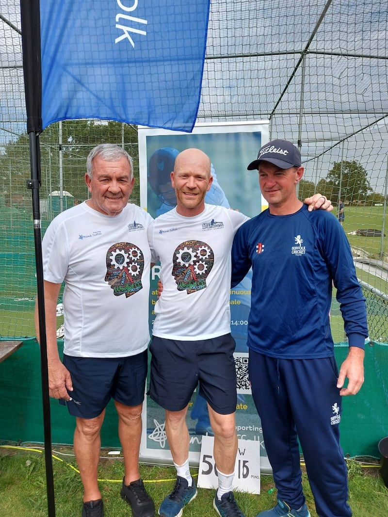 Andy Northcote standing with his father George and his friend and cricket coach, Terry Small