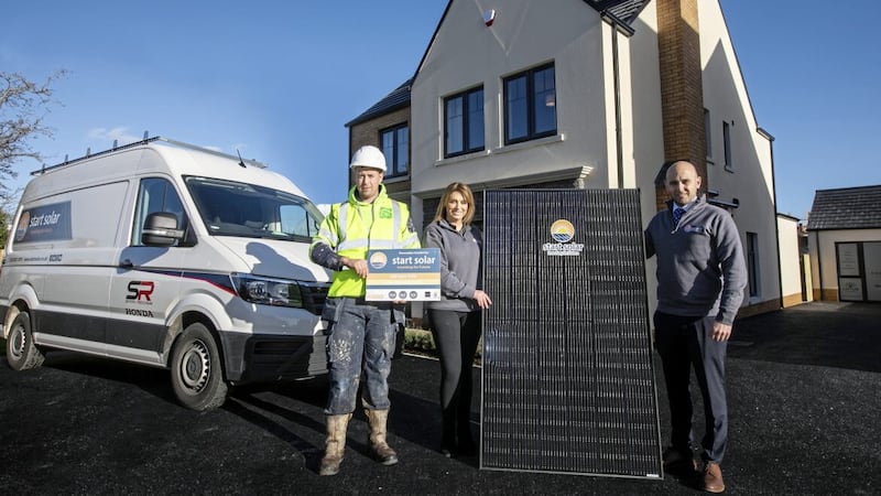 Pictured outside the Edenbrook show home in Banbridge are Gary O&rsquo;Hare, Carr Brothers site foreman; Angela Magowan, Start Solar installations controller; and Ben Moseley, Start Solar operations manager 