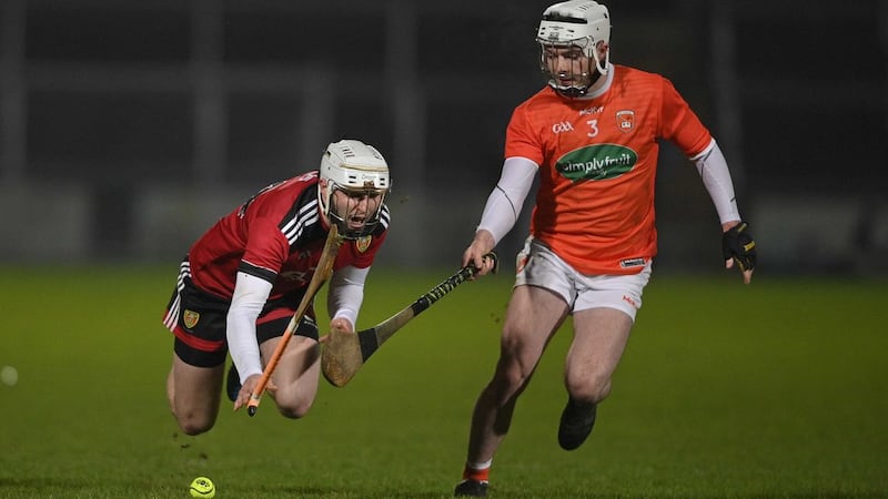 Down's Eoghan Sands takes on Armagh's Patrick Quinn during Wednesday night's McGurk Cup match at the Athletic Grounds <br />Picture by Mark Marlow&nbsp;