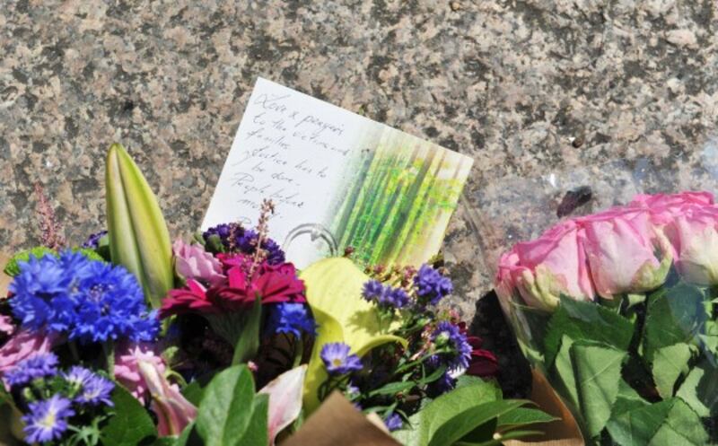 Floral tributes left at the roadside (Nick Ansell/PA)