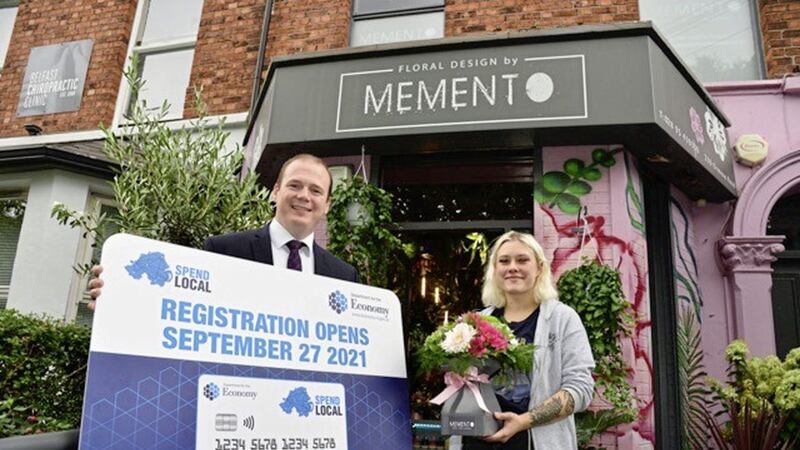 Economy Minister Gordon Lyons with Milana Surova of Memento florists on the Ormeau Road, Belfast ahead of next week&#39;s rollout of the High Street voucher scheme 