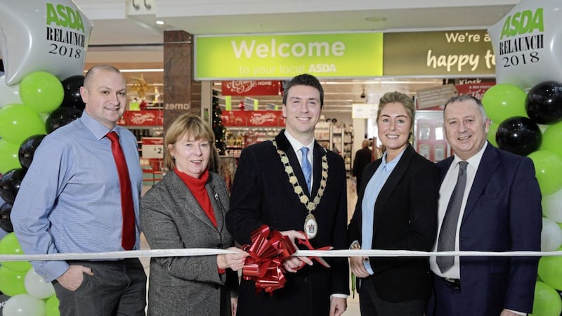 At the opening of the Newtownards store are (from left) George Rankin, senior director Asda NI; Councillor Deborah Girvan, mayor of Ards and North Down; Councillor Richard Smart; Kate Hamilton, general store manager Asda Newtownards; and Stephen Dunlop of the Green Party. Photo: Phil Smyth 