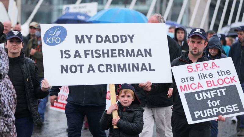 &nbsp;Fishermen protesting over cuts to quotas, the impact of Brexit and the EU Common Fisheries policy cross over the Samuel Beckett Bridge to the Convention Centre in Dublin, where TDs are sitting due to the coronavirus outbreak. Picture date: Wednesday June 23, 2021.