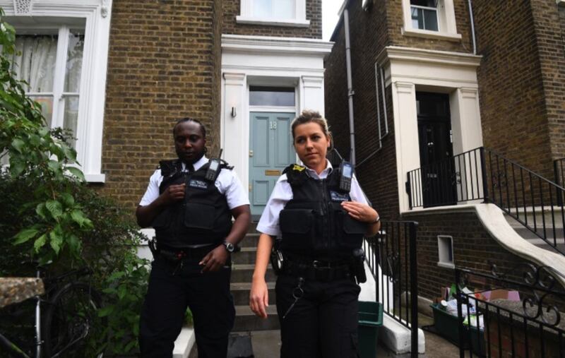 Police officers leave after having knocked on the door of Prime Minister Boris Johnson's senior aide Dominic Cummings, at his north London home. Picture by Victoria Jones, Press Association&nbsp;