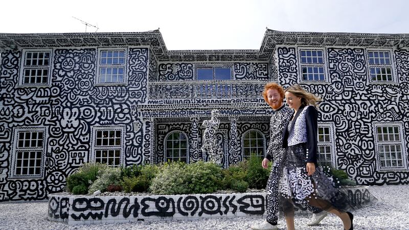 Sam Cox, also known as Mr Doodle, has put his own imprint on the 12-room mansion in Tenterden, Kent.